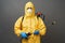 Coronavirus disinfection concept. Man in hazmat suit making disinfection