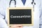 Coronavirus - doctor holding chalkboard with diagnosis