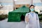 Coronavirus ER doctor in front of isolation hospital.Covid-19 physician with protective glasses / mask performing triage for virus