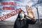 coronavirus global fight - woman wearing surgical mask and airport sign - cancelled flights - travel ban