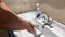 Coronavirus hand sanitizer sanitiser gel for clean hands hygiene corona virus spread prevention. Woman using alcohol rub