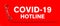 Coronavirus hotline with Covid-19 virus and a red telephone