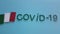 Coronavirus In Italy Or COVID-19 Chinese Virus, Italian Flag And word COVID-19, Dramatic Background Looping Animation