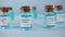 Coronavirus medication. Coronavirus covid-19 vaccine. A glass vial of covid-19