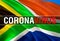 Coronavirus Monitor on South Africa flag background. Coronavirus hazard and Infection in South Africa concept. 3D rendering Corona