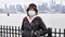 Coronavirus. New York. Woman with protection mask of virus epidemic and flu