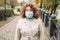 coronavirus outbreak virus afraid woman mask park