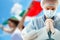 Coronavirus pandemic concept. Female doctor or nurse wearing protective suit, mask and gloves praying about sick patients and