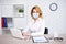 Coronavirus, pandemic, quarantine, health care and office work concept - mature business woman in mask working in office or at