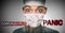 Coronavirus PANIC text title over scared doctor having corona virus epidemic fear wearing face mask as preventive