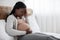 Coronavirus And Pregnancy. Sick Black Pregnant Woman Feeling Unwell, Having Covid-19 Symptoms