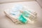 Coronavirus prevention concept - Surgical travel masks hand disinfectant gel and and towel