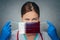 Coronavirus in Qatar Female Doctor Portrait hold protect Face surgical medical mask with Qatar National Flag. Illness, Virus Covid