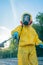 Coronavirus. A sanitation worker wearing a mask and cleaning the streets. Sterilize urban decontaminate city. Disinfecting against