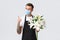 Coronavirus, social distancing business during covid-19 pandemic concept. Cute and friendly florist, salesman in flower