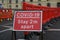 Coronavirus `stay 2 meters apart` warning sign near road works