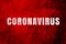 Coronavirus text on red background