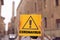 Coronavirus. Text on a sign symbolizing danger. Pandemic 2019 and 2020. Girl in the city of Italy