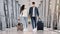 Coronavirus Travels. Arab Couple Wearing Face Masks Walking With Luggage At Airport