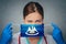 Coronavirus in U.S. State Louisiana, Female Doctor Portrait, protect Face surgical medical mask with Louisiana Flag. Illness,