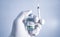 Coronavirus vaccine ampoule, bottle for injection with syringe, covid-19 vaccine