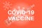 Coronavirus Vaccine rollout - COVID-19 vaccine bottle on a blue background with virus logo