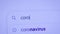 Coronavirus is written in the search bar with the cursor and the magnifying glass symbol. Concept of pandemic, safety, prevention