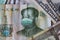 Coronavirus Wuhan virus illness. Concept: Quarantine in China, 1 Yuan banknote with face mask. Economy and financial markets