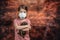 Coronovirus Quarantine, Stay Home Concept. Covid-19 pandemic. Little girl Wearing Respirator Mask