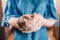 Coronovirus spread prevention - Caucasian woman washes her hands thoroughly with soap