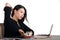 Corporate company portrait of young beautiful and busy Asian Chinese business woman working at office computer desk concentrated i
