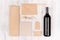 Corporate identity template for wine industry, blank brown kraft packaging, stationery, merchandise set with bottle red wine on s