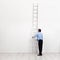 The corporate ladder - businessman at the start of