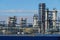 Corps of Moscow refinery in spring in clear weather