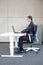 correct sitting position at workstation - man in suit -