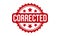 Corrected Rubber Stamp. Red Corrected Rubber Grunge Stamp Seal Vector Illustration - Vector