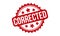 Corrected Rubber Stamp. Red Corrected Rubber Grunge Stamp Seal Vector Illustration - Vector