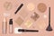 Corrective makeup flat lay set on nude color surface