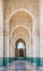 The corridor in Grand Mosque of Hassan II with blue sky
