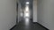 Corridor in office building with light in windows