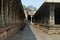 A corridor between the Pillared cloisters and the Ranga Mandapa, Virupaksha Temple, Hampi, karnataka. Sacred Center. View from the