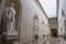 corridor with several statues in white stone of the palace of Versailles France