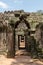 Corridor through stone doorways at Ta Som