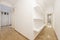 Corridors of a house with parquet floors, plaster shelves