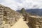 corridors of Machu Picchu and Huayna Picchu mountain in Peru, seen from the door of the sun