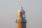 Corrubedo lighthouse in Galicia, Spain with a grey background