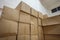 Corrugated Cardboard storage boxes stacked in warehouse