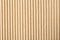 Corrugated cardboard surface as background, top view