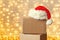 Corrugated fiberboard boxes with christmas lights on background