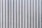 Corrugated grey fence steel siding background